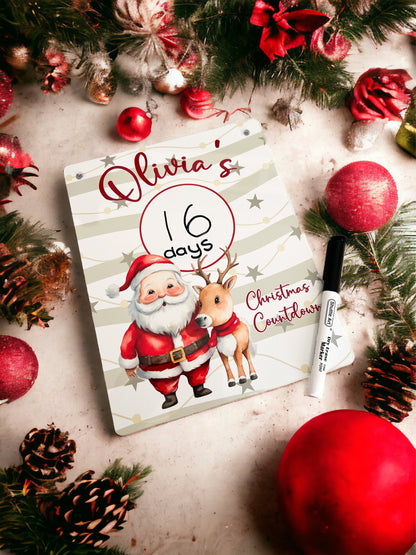 Close-up of personalised Christmas countdown board showing wipe-clean surface and custom name