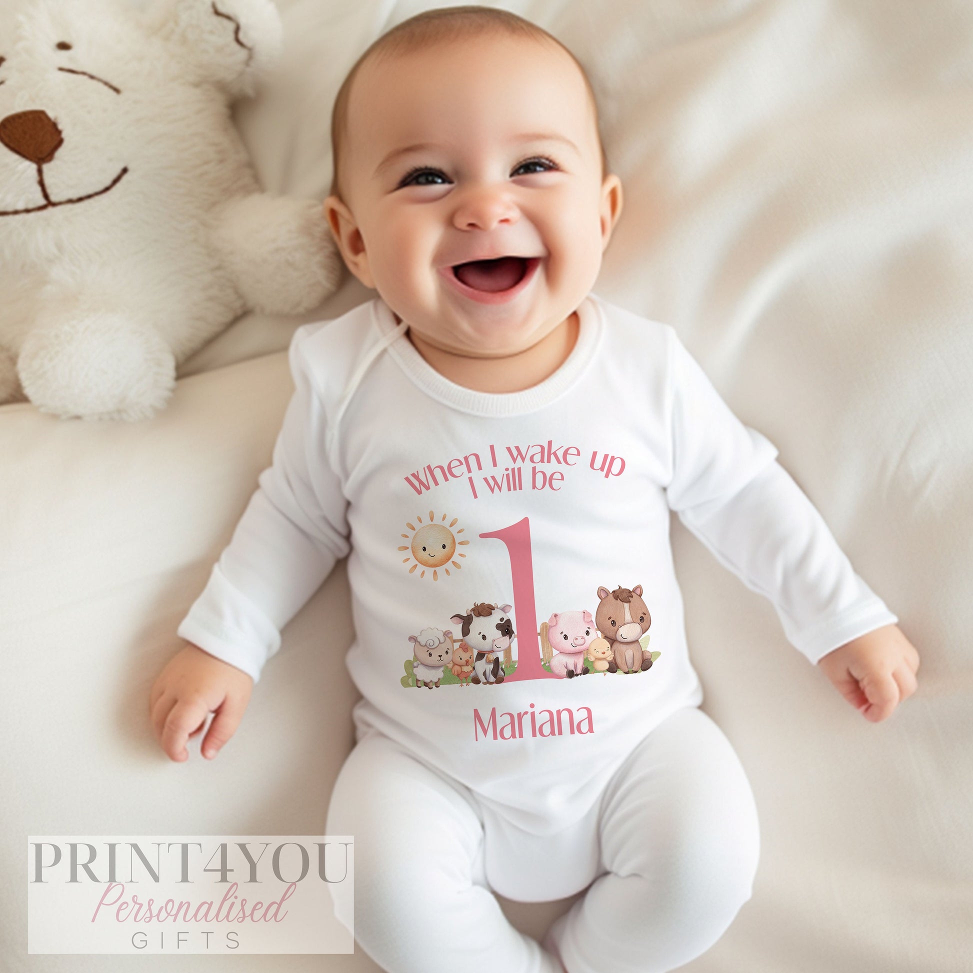 Full range of personalised pink farm animals first birthday garments available to choose from.
