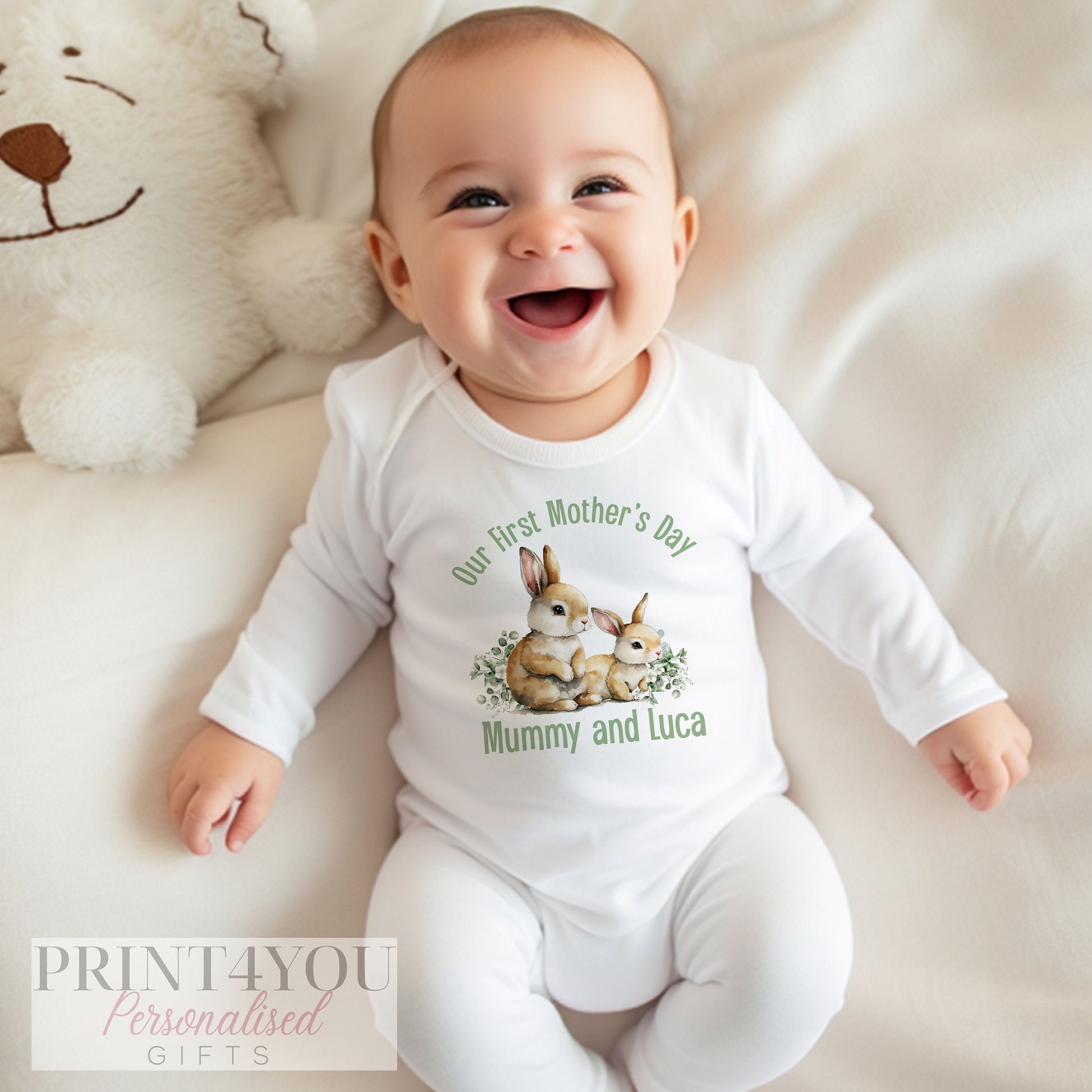 Close-up of the personalised design on a first Mother's Day baby vest.